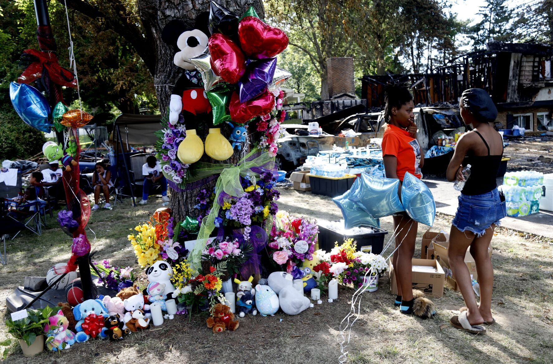 Family and friends honor the victims of house explosion near Blackjack